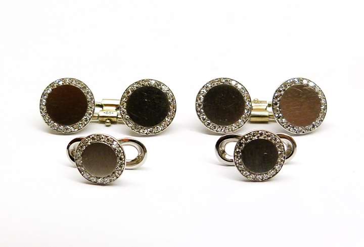 Pair of platinum and diamond cufflinks and two shirt studs